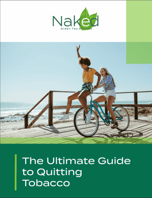 Women biking on boardwalk by the sea.